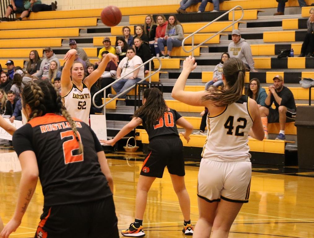 EWC sophomore Paula Martinez Sanz passes to freshman Montse Gutierrez during the first half of the Lancers' 88-44 first-round win against Central Wyoming Friday night in Torrington.